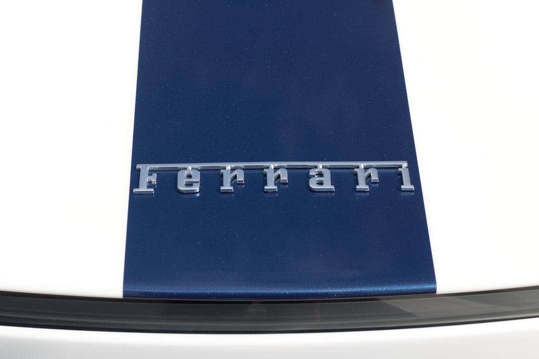 ferrari-emblem-on-a-white-and-blue-car-vegy1zhbjlg